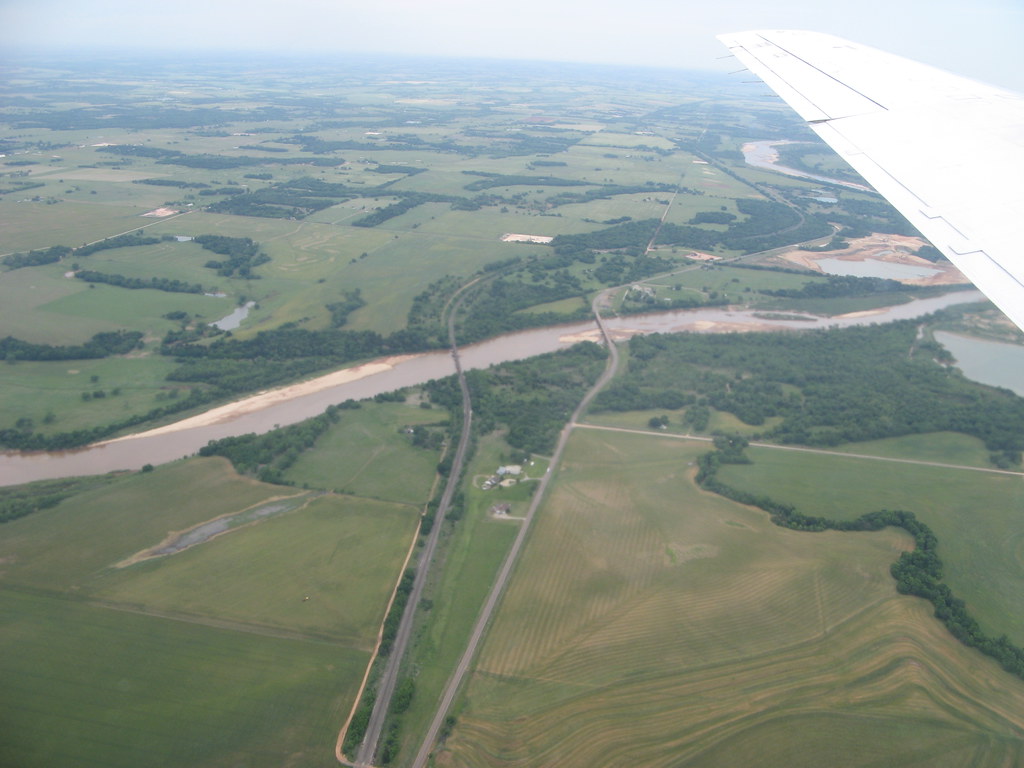 During low flights over northern Oklahoma for ARM’s HI-SCALE field campaign, typical views included rangeland and farm fields intersected by rivers and patches of forest. Unraveling the interaction of complex terrain with atmosphere was part of the HI-SCALE mission. Photo is courtesy of ARM.
