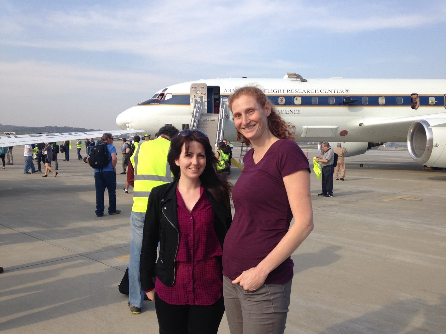Lamb, at left, is pictured with colleague Anne Perring of Colgate University. Behind them is the NASA DC-8 during its field deployment in South Korea during the 2016 Korea-United States Air Quality (KORUS-AQ) field study.